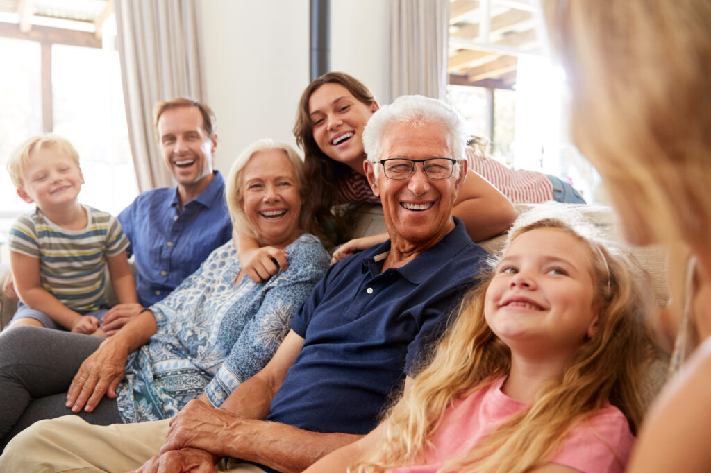 Three generation of a family sitting together